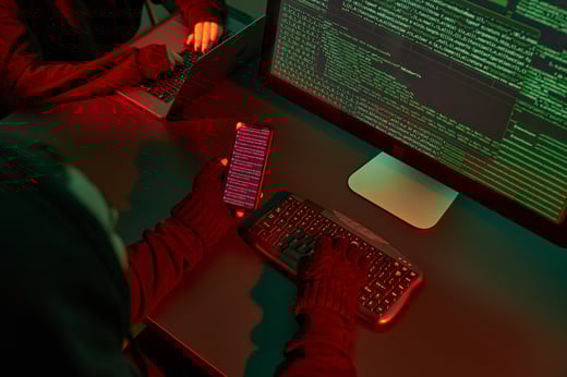 anonymous-people-using-computer-and-coding-to-brea-2023-11-27-05-12-01-utc