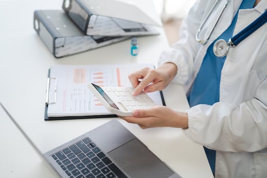 doctor-physician-with-stethoscope-calculate-medica-2024-12-19-12-43-19-utc